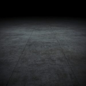 Dark spotlit concrete studio background with copy space for modern coaching product image.